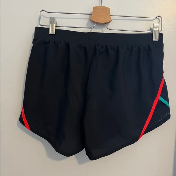 UnderArmor training shorts, black with orange and blue borders - Picture 2 of 2